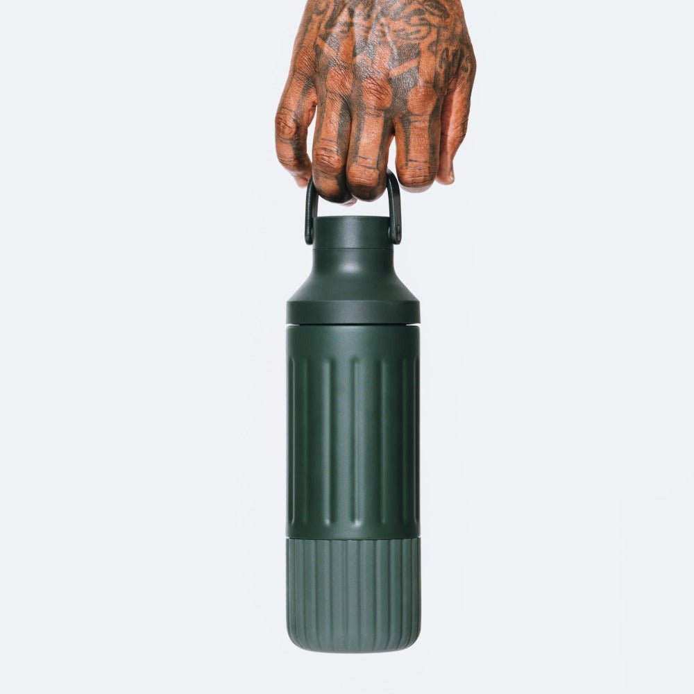 Beast Mode bottle accessory being grabbed by a hand from the top | Forest Green